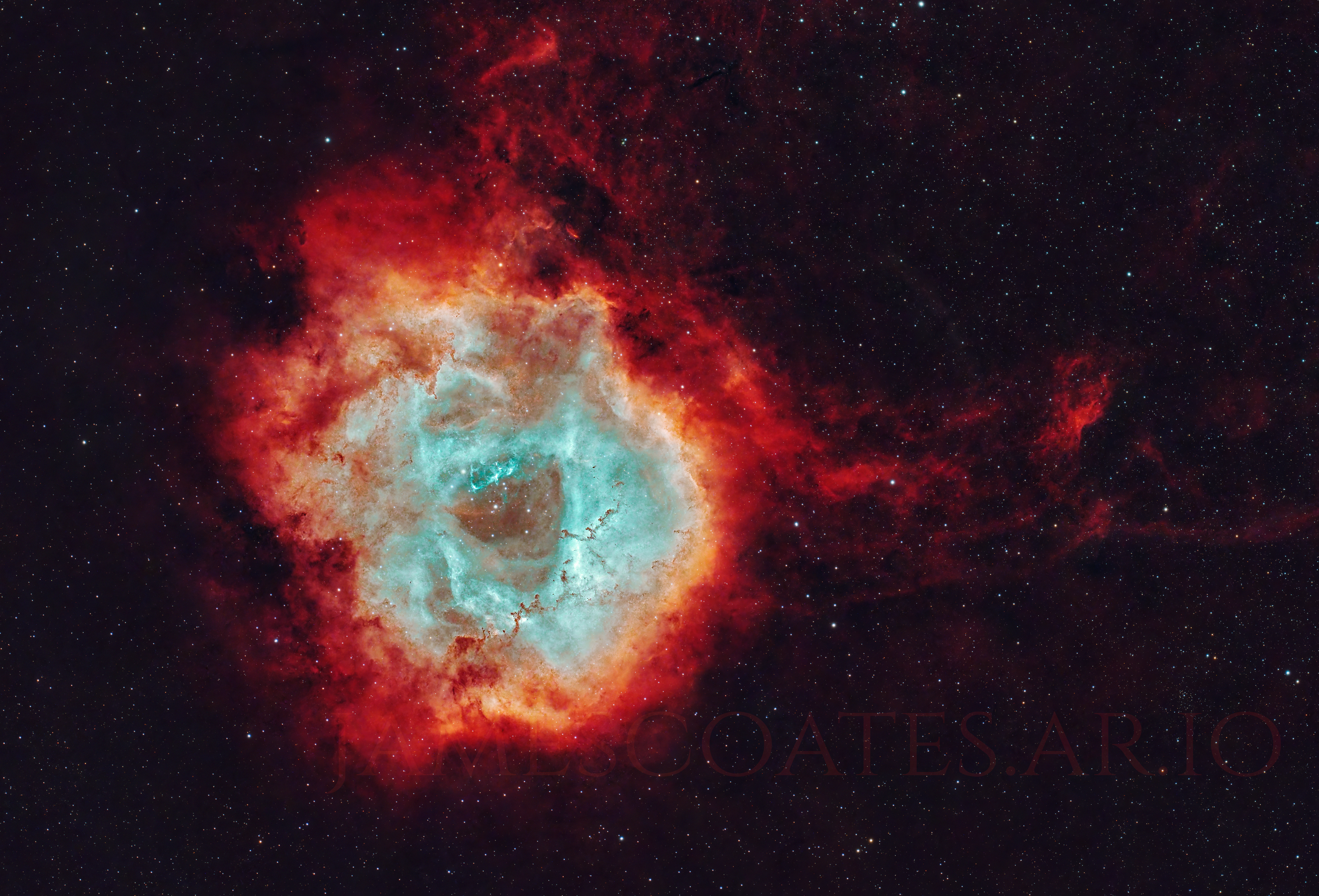 The Rosette Nebula in Monoceros, an emission nebula with an open cluster clearing its centre